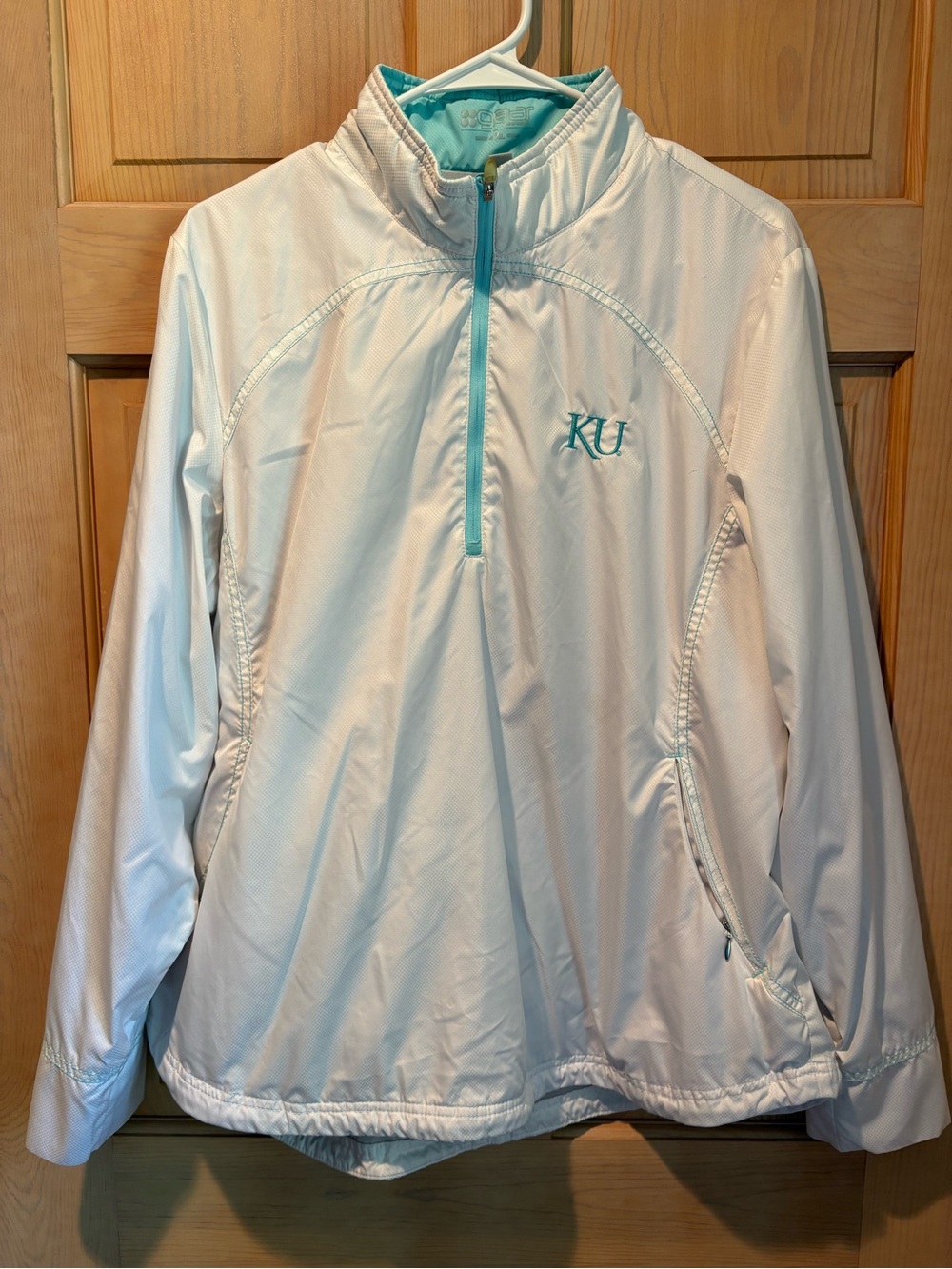 Ladie’s KU Gear For Sports White Pullover Jacket with Teal Trim